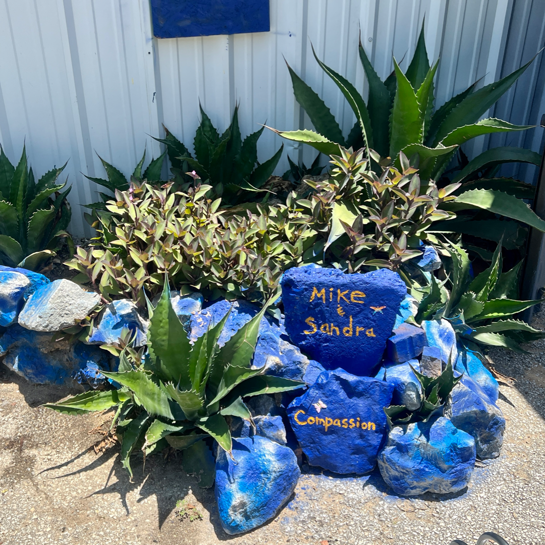 Outdoor project at Church on the Slab, painted rocks and landscaping